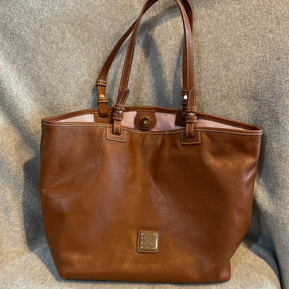 Brown exterior, white/pink interior.